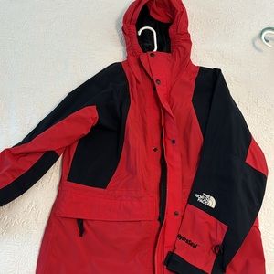 North Face red/black jacket. Shell zips into jacket. Inner  pocket. Kids large.